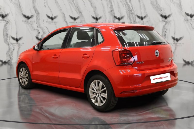 2015 Volkswagen Polo in red — photo 4 of 10